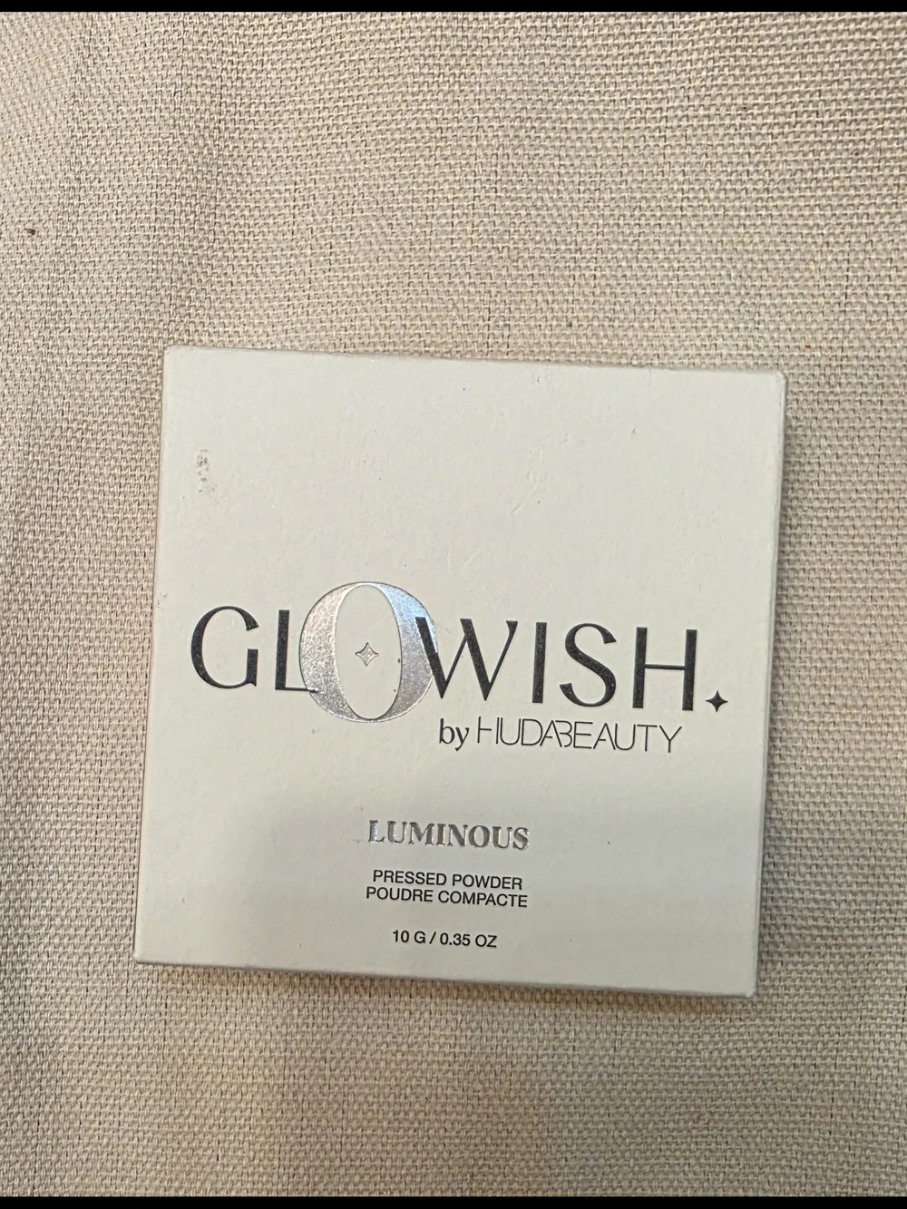 HUDA BEAUTY Glowish Luminous Pressed Powder & Black Life Liner Set